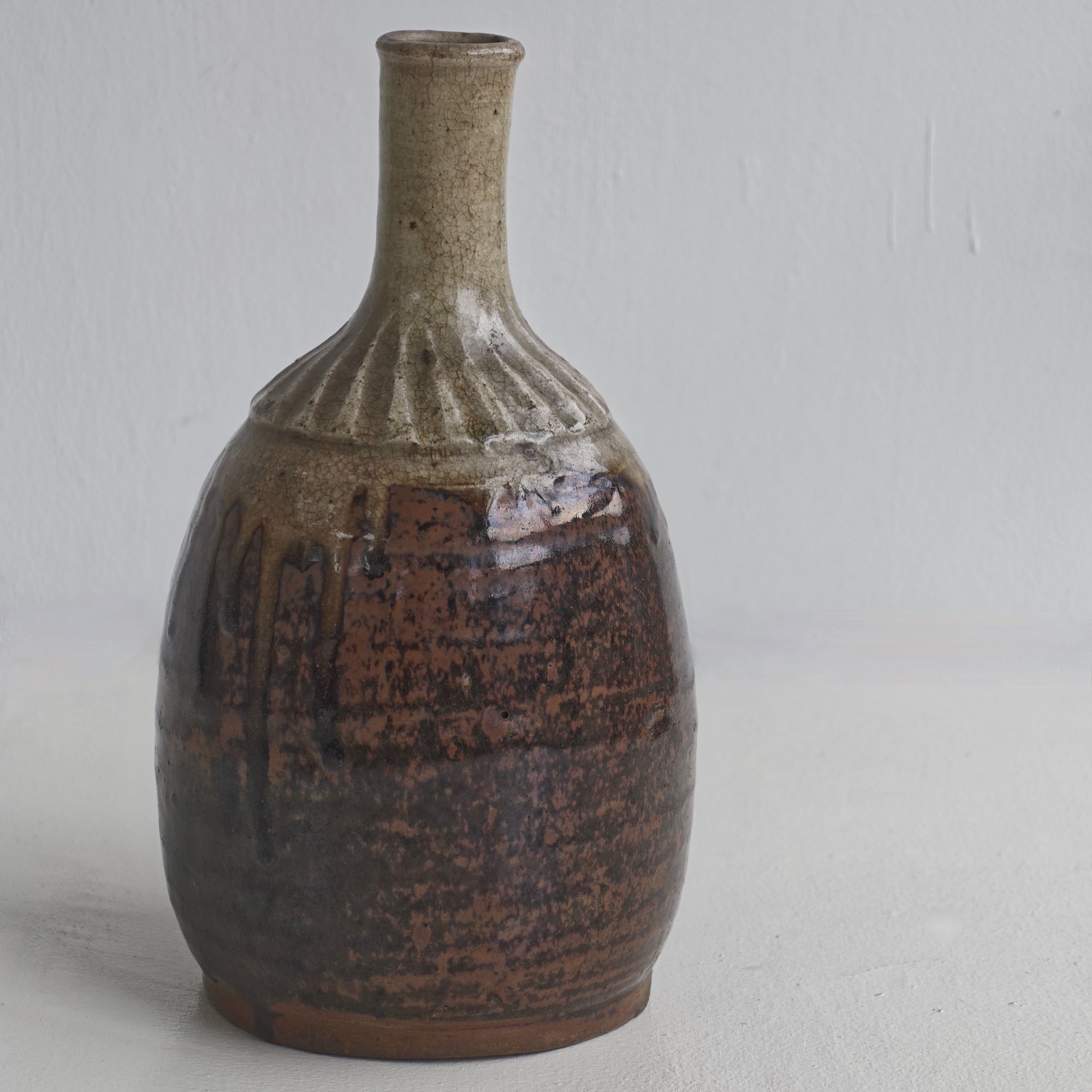 Fluted sake bottle